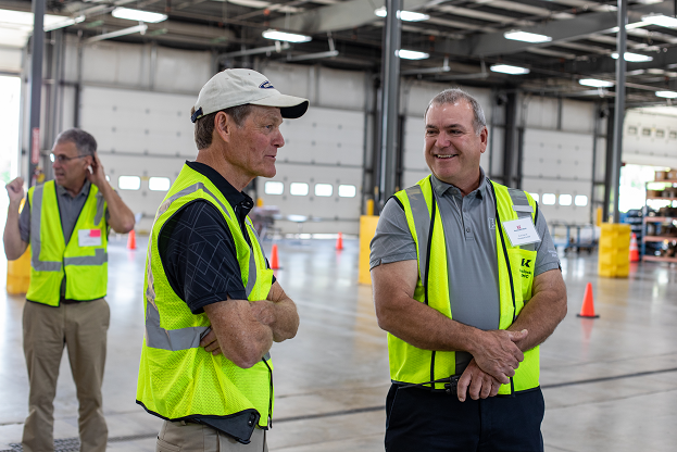 KREMC CEO Kurt Carver stands and talks with a colleague at last year's annual meeting.