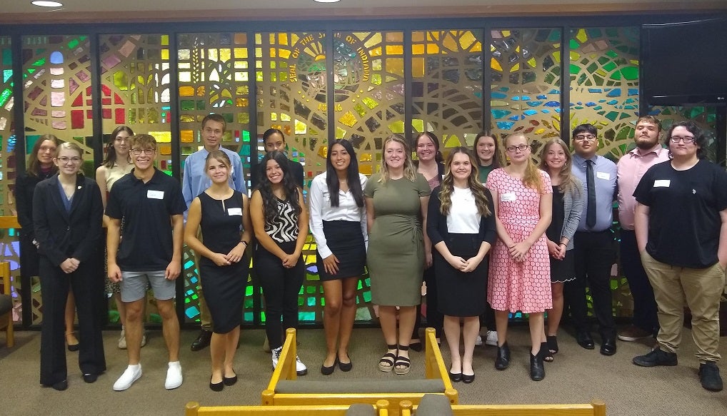 Student volunteers of the Kosciusko Teen Court stand together in a group.